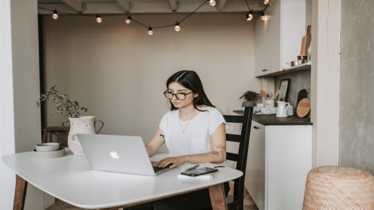 Woman reading on How to Transfer Shares from Zerodha to Grow